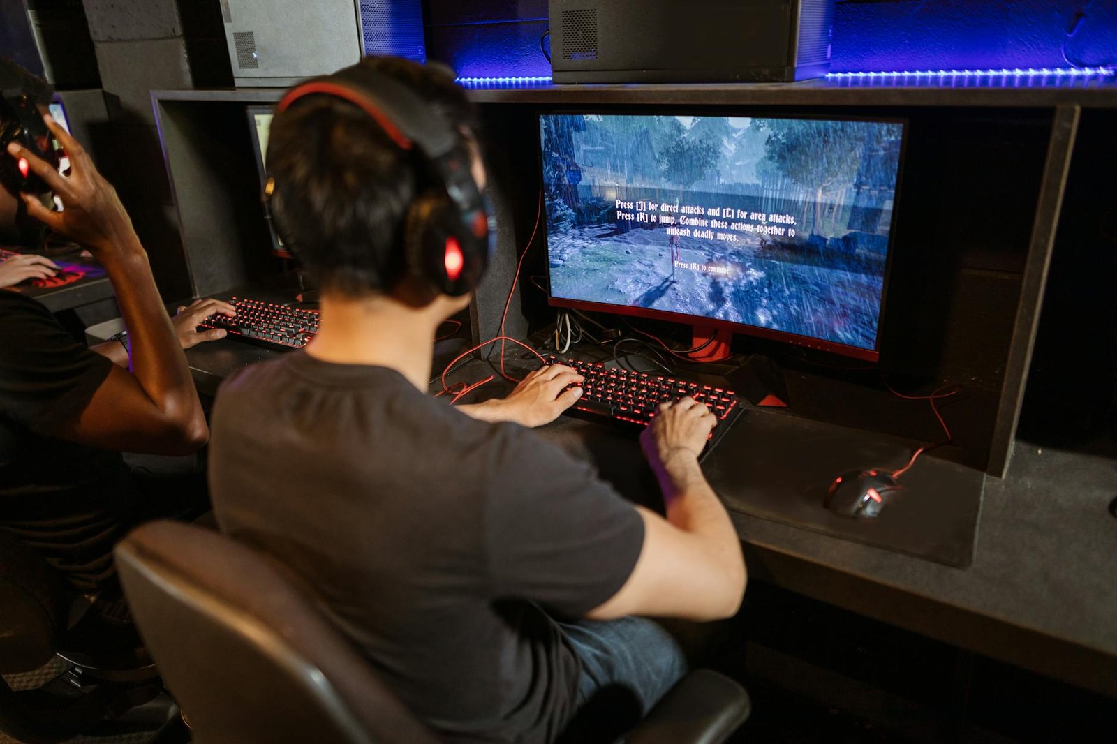 Gamer impatiently looking at a game loading screen on a PC monitor