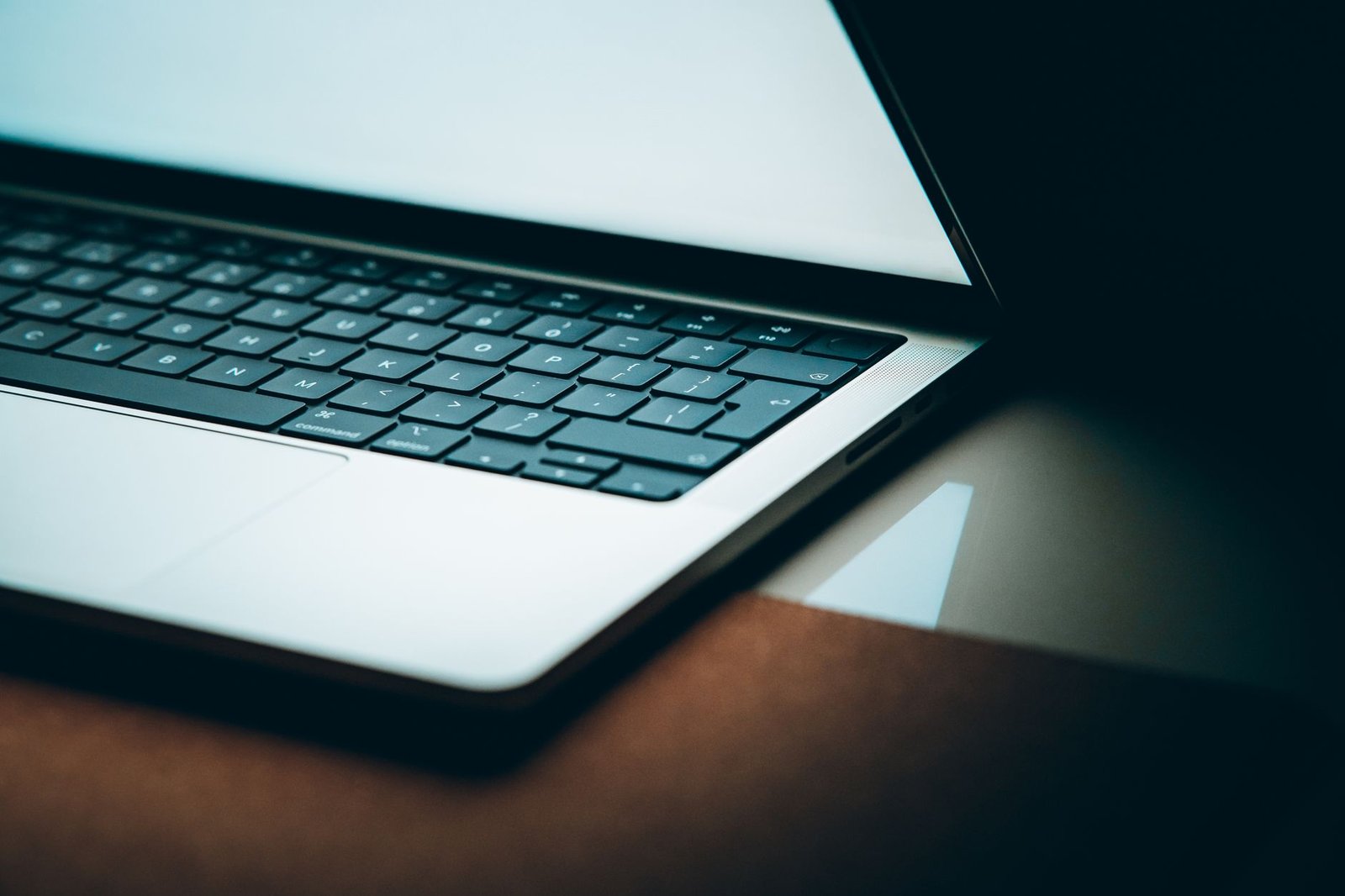 An open MacBook Air M4 displaying its keyboard and Retina display.