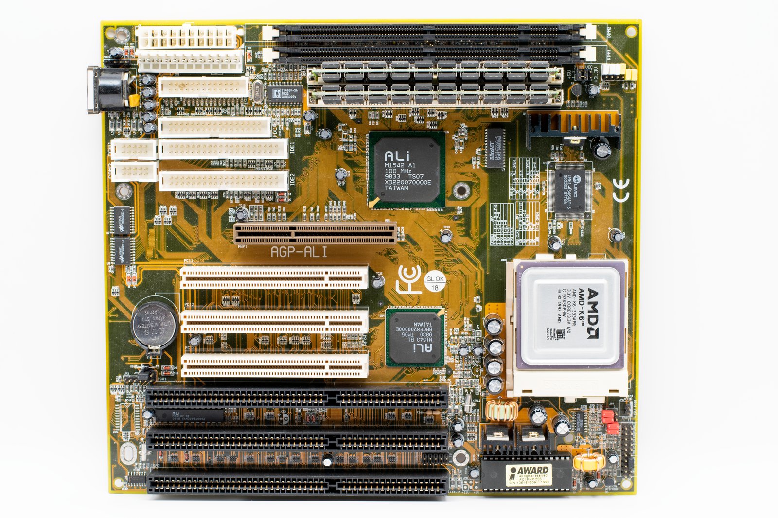 Close-up of various computer hardware components like RAM modules.