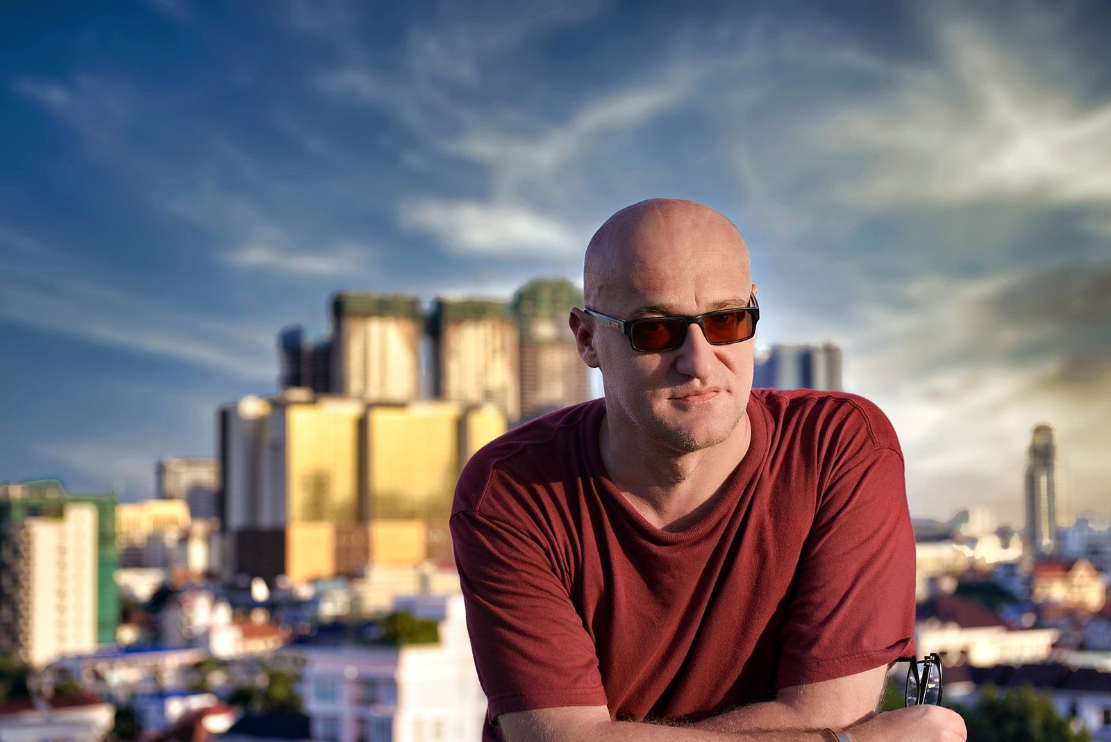 A photorealistic portrait of a person standing on a bustling city street, generated by AI.