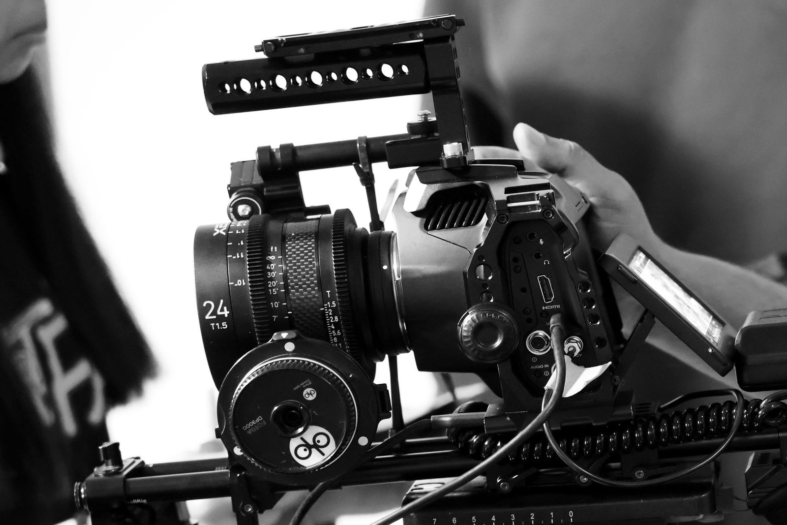 Professional video camera rig equipped with a compact external SSD for direct ProRes recording.