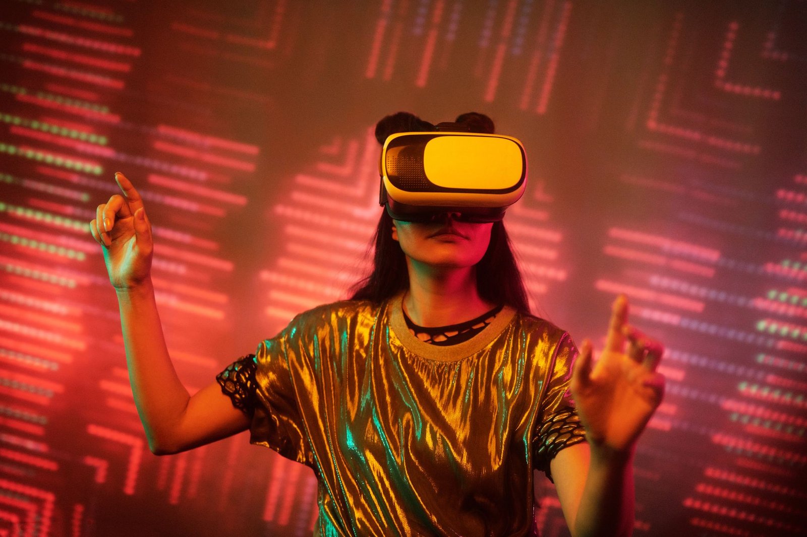 A person smiling while wearing a Meta Quest 4 VR headset in a living room.