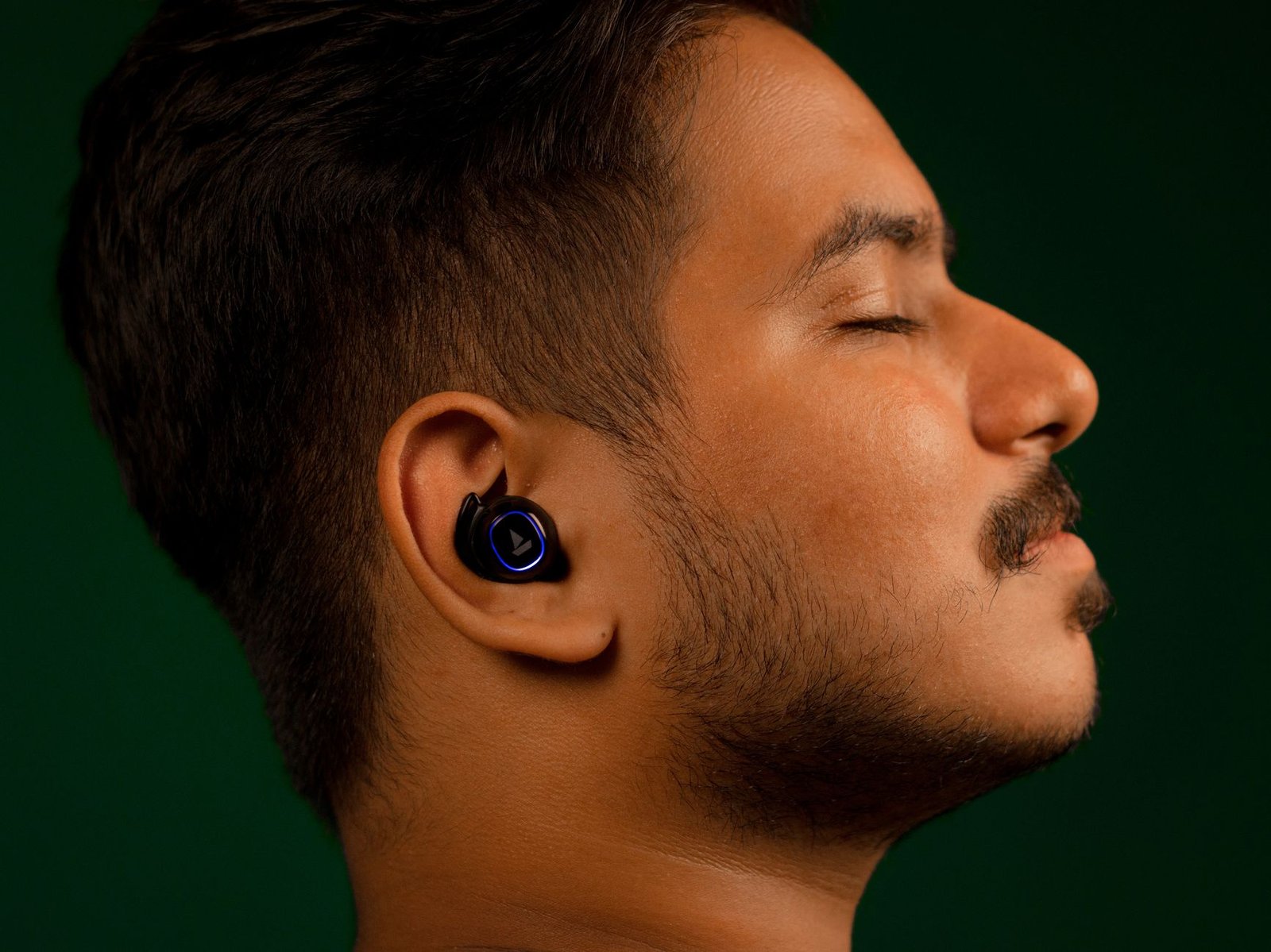 Close-up view of the SonicFlow Pro X wireless earbuds showing their design.