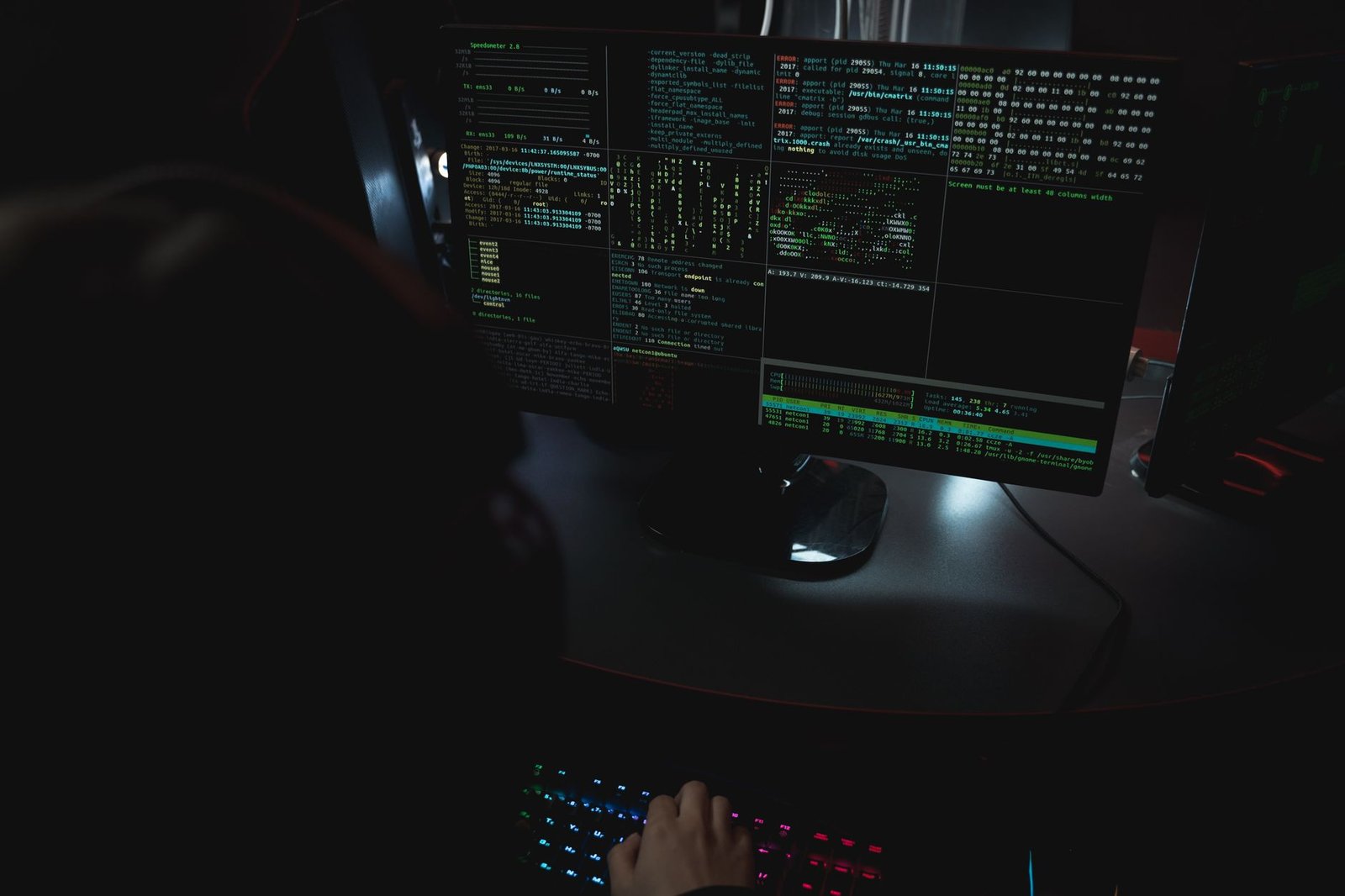 Person typing code on a Linux terminal screen